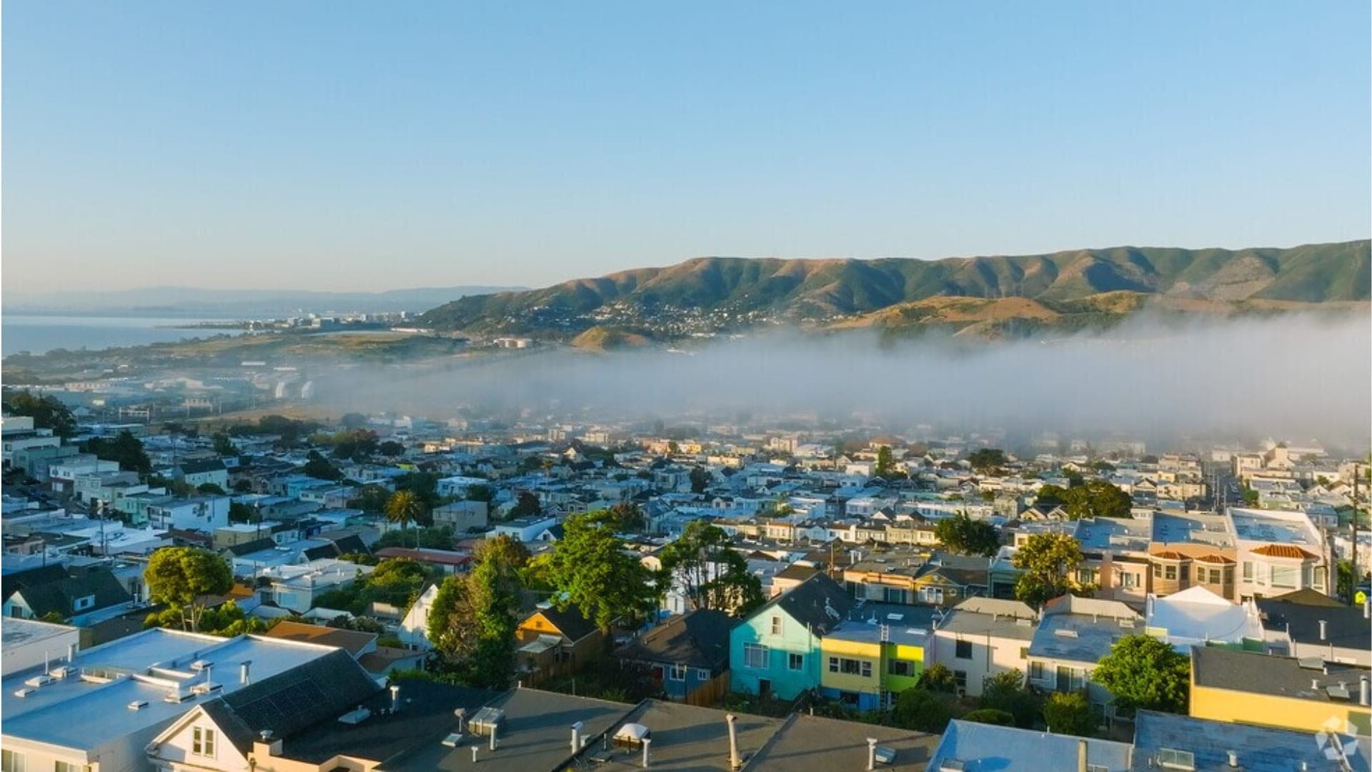 San Francisco neighborhoods rolling under the morning fog